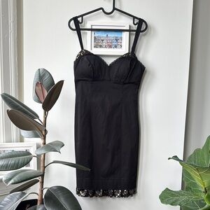 Elegant Black Dress with Metallic Details